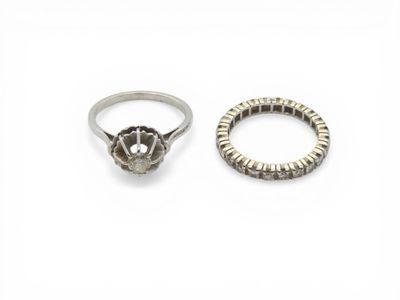 two rings and a ring with a flower on it