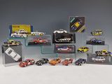 a lot of toy cars on display in a display case