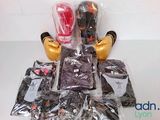 a pile of boxing gloves and other items on a table