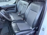 the interior of a car with black leather seats and a steering wheel