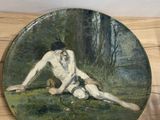 une assiette sur laquelle est représenté un homme nu allongé par terre