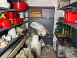 a room filled with lots of items and containers