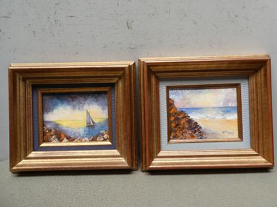 tableau représentant un voilier et un voilier sur une plage