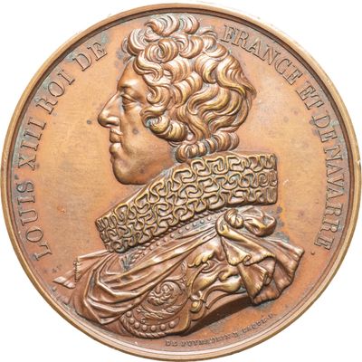 une image montrant un gros plan d'une médaille sur fond blanc