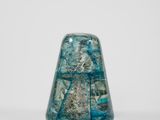 an image of a blue glass object on a white surface