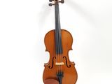 an old violin with a bow on a white background