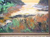 a painting on the wall of a building with a view of the ocean