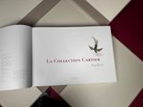 an open book with a picture of a bird on it