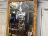 a mirror that is sitting on top of a table