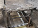 two tables that are sitting next to each other on the floor
