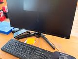 an image of a computer desk with a keyboard and mouse