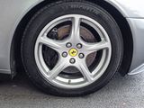 a close up of a car tire on the street