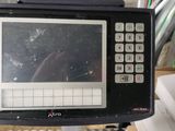 a computer monitor sitting on top of a desk