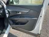 a car door open with the driver ' s side door open