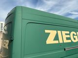 a green van with a zieg logo on the side of it