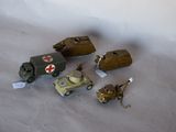 a lot of toy vehicles that are on a table