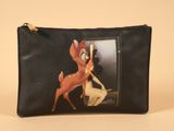 a close up of a purse with a picture of a deer on it
