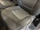 the interior of a car with the seat up and the front seat down