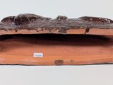 an image of a piece of wood that is sitting on top of a table