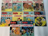 a lot of comics on display on the table