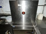 a stainless steel sink in the middle of a kitchen