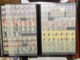 a lot of different stamps on the pages of a book