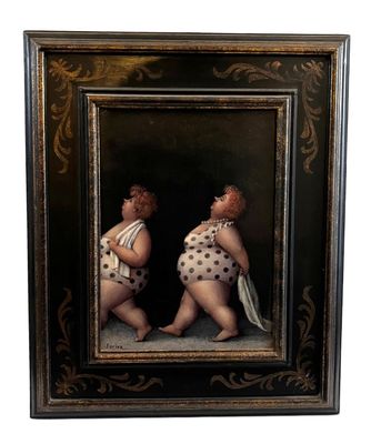 tableau représentant deux bébés, dans un cadre noir à pois blancs
