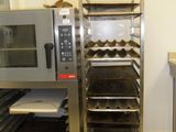 an image of a commercial oven with trays of food