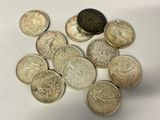 a lot of coins that are sitting on a table