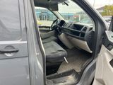 the interior of a car with the door open and the driver ' s seat down