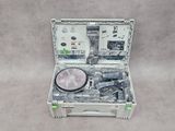 a tool case with tools inside of it on the floor