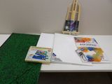 a table with a book and a pair of scissors on it