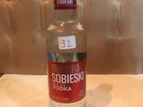 a bottle of vodka that is sitting on a table