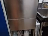 an image of a kitchen with a stove, sink, and dishwasher