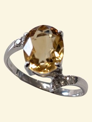 silver ring with citrine stone and diamond accents