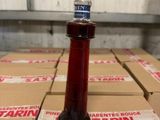 a bottle of wine sitting on top of a box