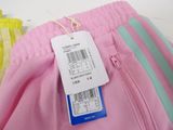 a label on the bottom of a pink pants