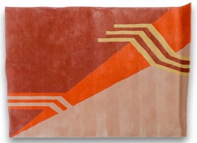 an orange and beige rug with a geometric design on it