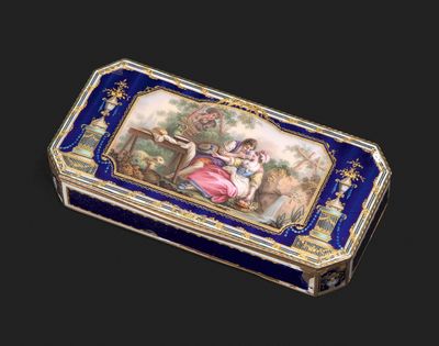 une boîte bleue et dorée avec une peinture dessus