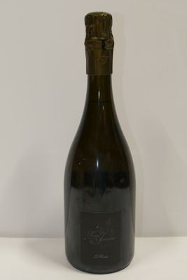 a bottle of wine that is sitting on a table