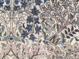 a close up of a rug with birds and flowers on it