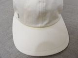 a white hat that is sitting on a table