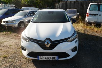 a white car that is parked in a lot