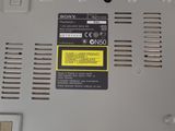 a close up of a laptop with a yellow sticker on it