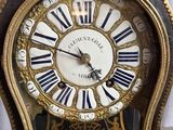 a clock that is sitting on top of a table