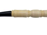 a close up of a pipe with a carved handle on a white background