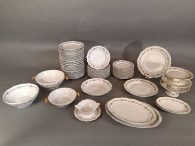 many different types of plates and bowls on the table