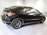 a picture of a black honda hrx parked in a garage