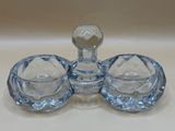 an image of a clear glass perfume bottle with a glass stopper