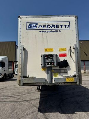 a delivery truck that is parked in a parking lot